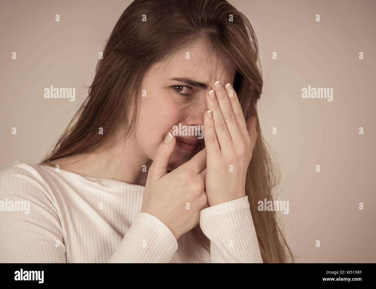 Close up portrait of young teen woman feeling afraid and shocked ...