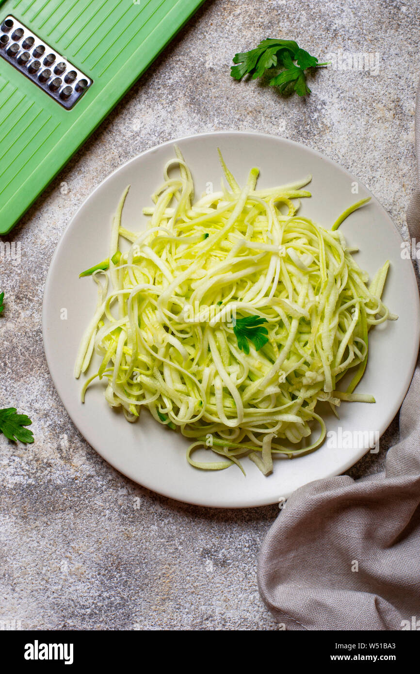 Raw green uncooked zucchini pasta Stock Photo Alamy