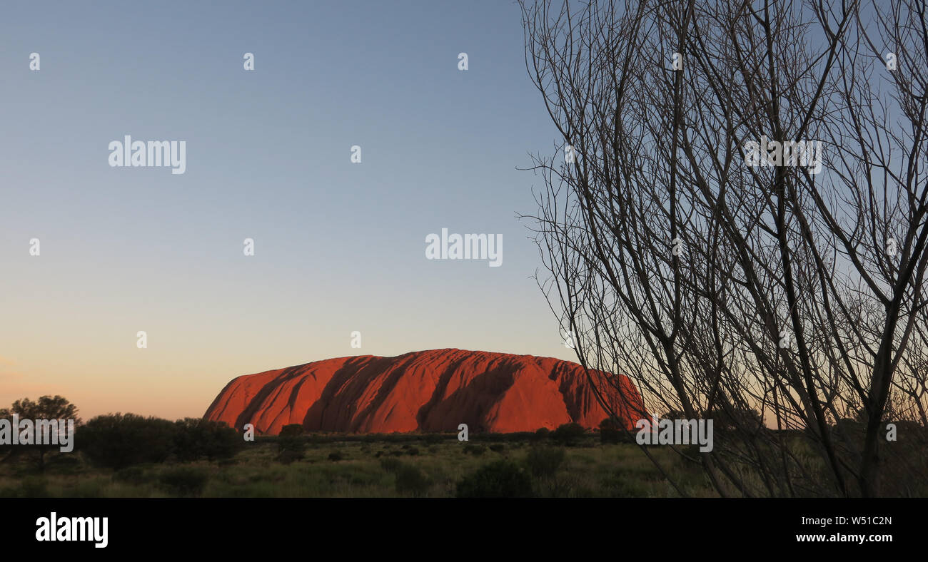 Uluru or Ayers Rock in Central Australia the huge sandstone monolith that is sacred to indigenous Australians. Stock Photo