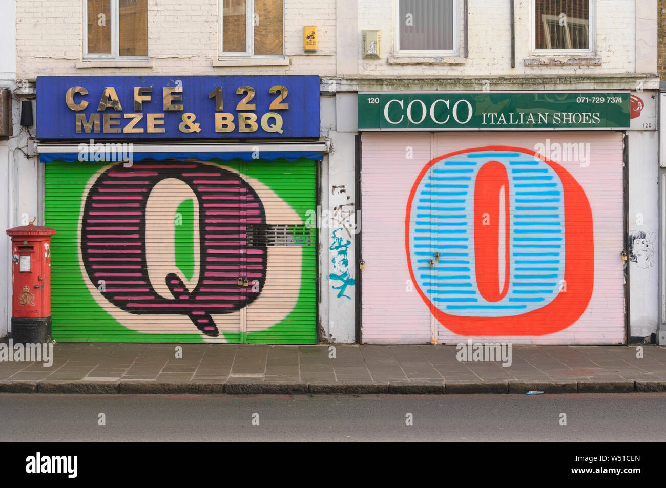 Street Art, by Street Artist 'Eine', who paints gaint letters on shop window shutters, Kingsland Road. London, Britain. Stock Photo