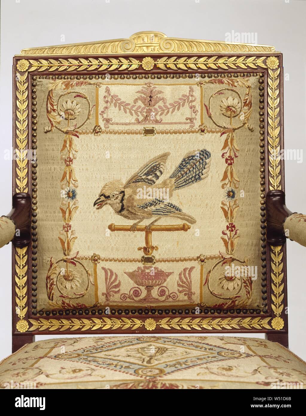 One Armchair, Frames attributed to François-Honoré-Georges Jacob-Desmalter (French, 1770 - 1841), Tapestry upholstery by the Beauvais Manufactory (French, founded 1664), Beauvais, France, about 1810, Mahogany and beech, gilt-bronze mounts, wool and silk, 100.6 × 63.5 × 50.8 cm (39 5/8 × 25 × 20 in Stock Photo