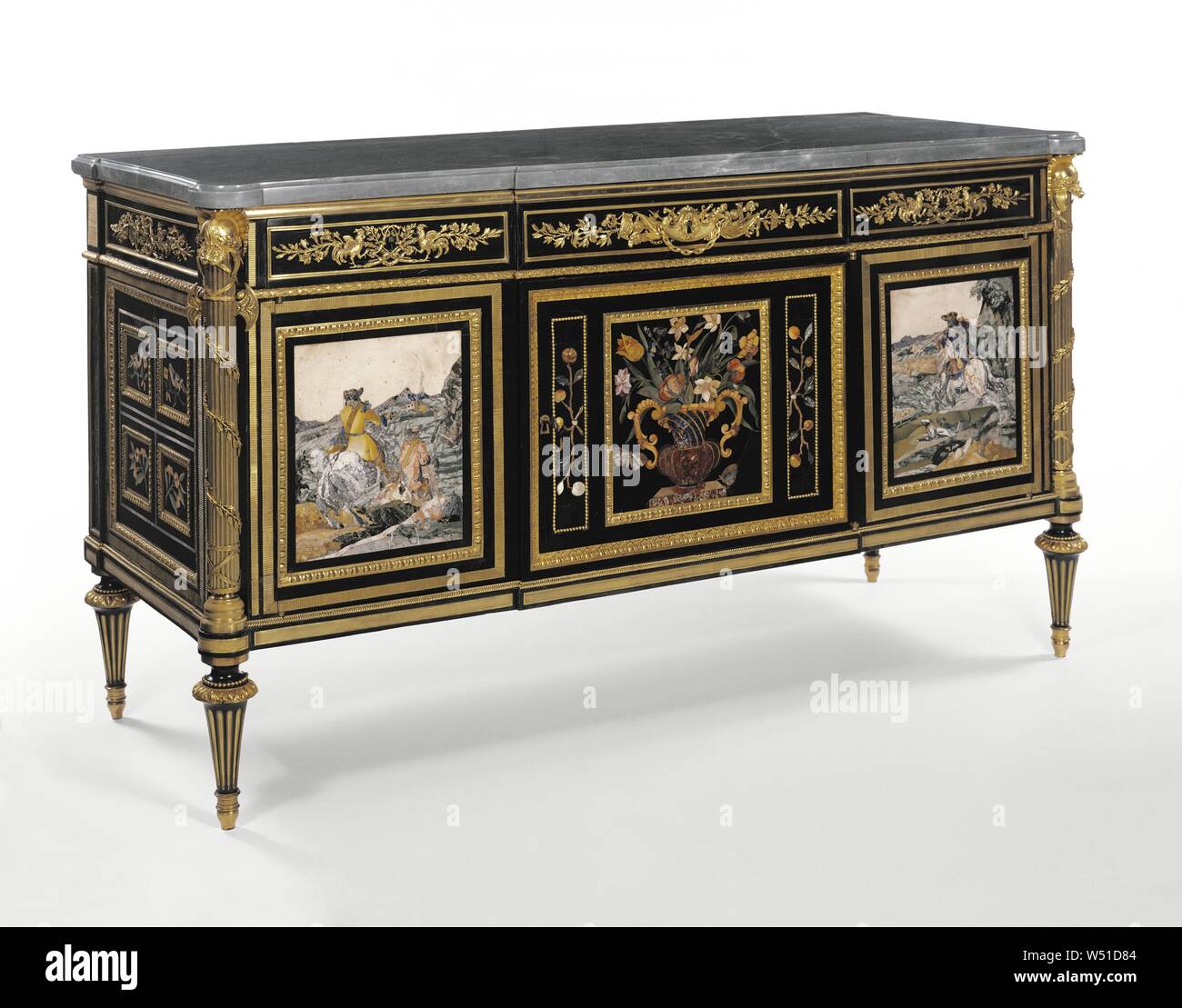 Cabinet, Case by Guillaume Benneman (French, died 1811), Gilt-bronze mounts after models by Gilles-François Martin (French, about 1713 - 1795), Mounts cast by Etienne-Jean Forestier (French (master 1764)), Mounts cast by Denis Bardin (French, active 1775 - 1799 (master 1778)), Mounts chased by Pierre-Philippe Thomire (French, 1751 - 1843 (master 1772)), Mounts gilt by Claude Galle (French, 1759 - 1815 (master 1786)), Paris, France, 1788, pietra dura plaque late 17th - 18th century, Oak veneered with ebony, mahogany, and lacquer, set with pietra dura plaques, gilt bronze mounts, bleu turquin Stock Photo