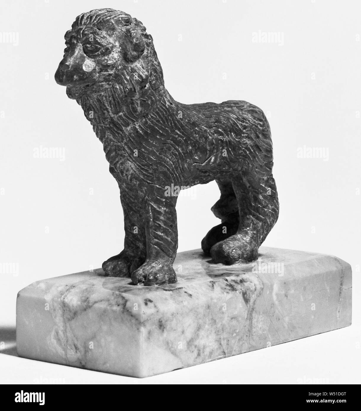 Statuette of a Lion, Unknown, Roman Empire, 1st - 2nd century, Bronze, 7.5 cm (2 15/16 in Stock Photo