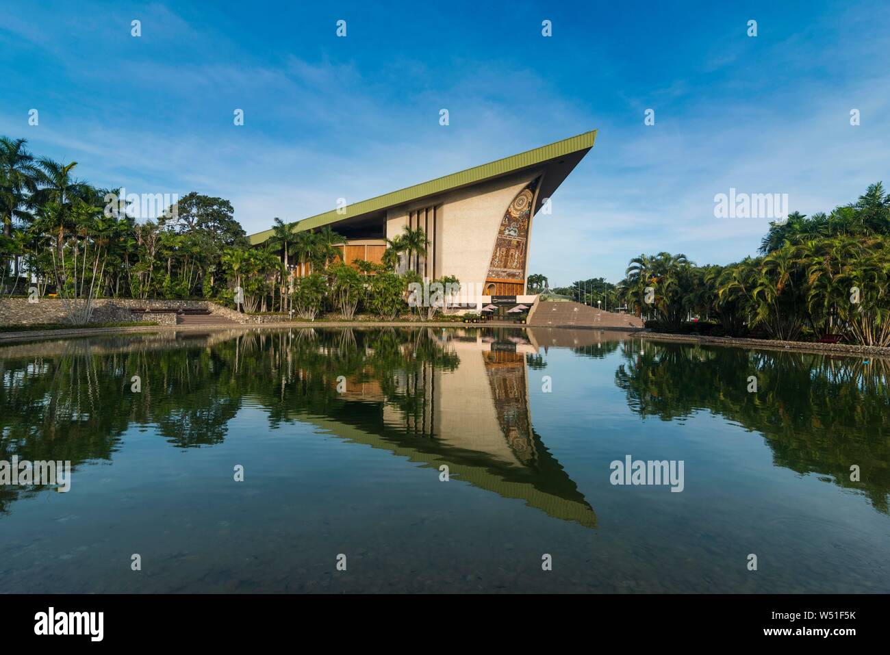 National Parliament reflecting in the water, Port Moresby, Papua New Guinea Stock Photo