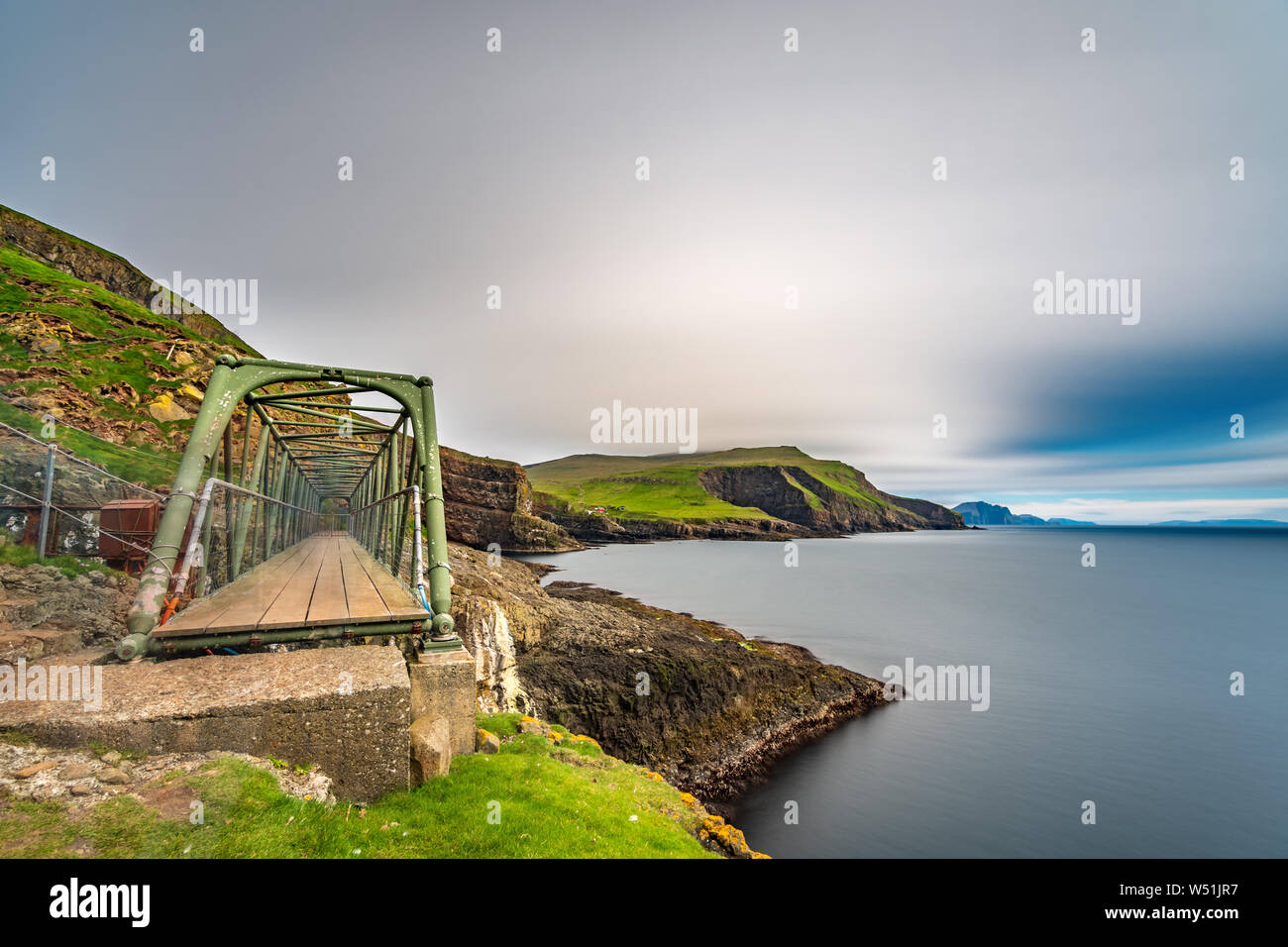 Mykines susspension bridge in Faroe Islands, long exposure Stock Photo
