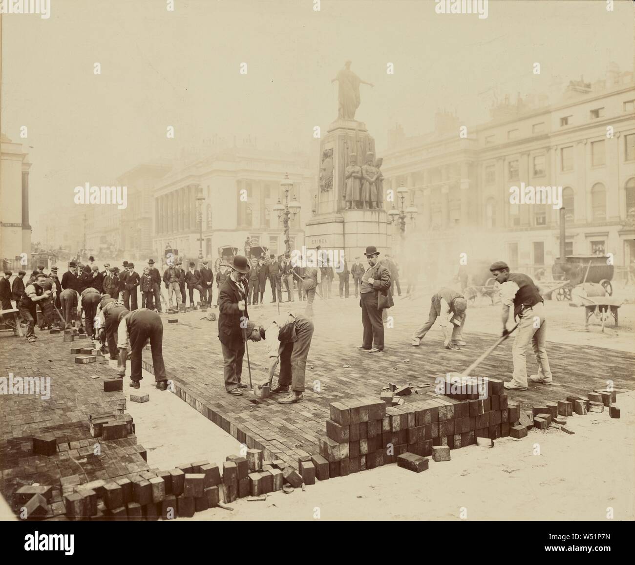 Men Laying Bricks, Henry Bedford-Lemere (British, born 1840), Europe, 1903, Albumen silver print, 24 x 29.2 cm (9 7/16 x 11 1/2 in Stock Photo