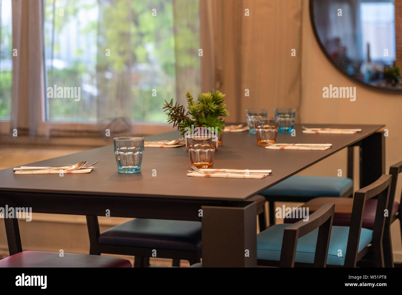 Beautiful decorated table set up for dinner at home Stock Photo