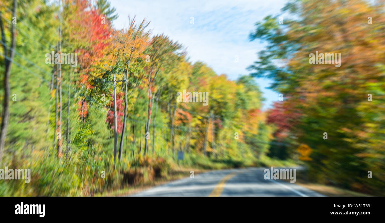 Road across foliage, New England Stock Photo - Alamy