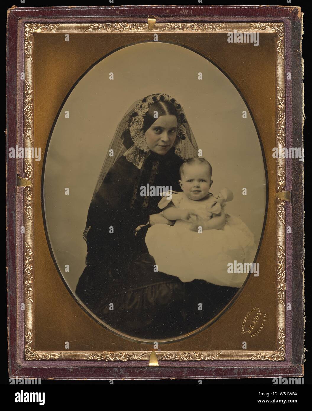 Portrait of a woman and child, Mathew B. Brady (American, about 1823 - 1896), about 1851, Ambrotype, hand-colored, 12.4 × 9.2 cm (4 7/8 × 3 5/8 in Stock Photo