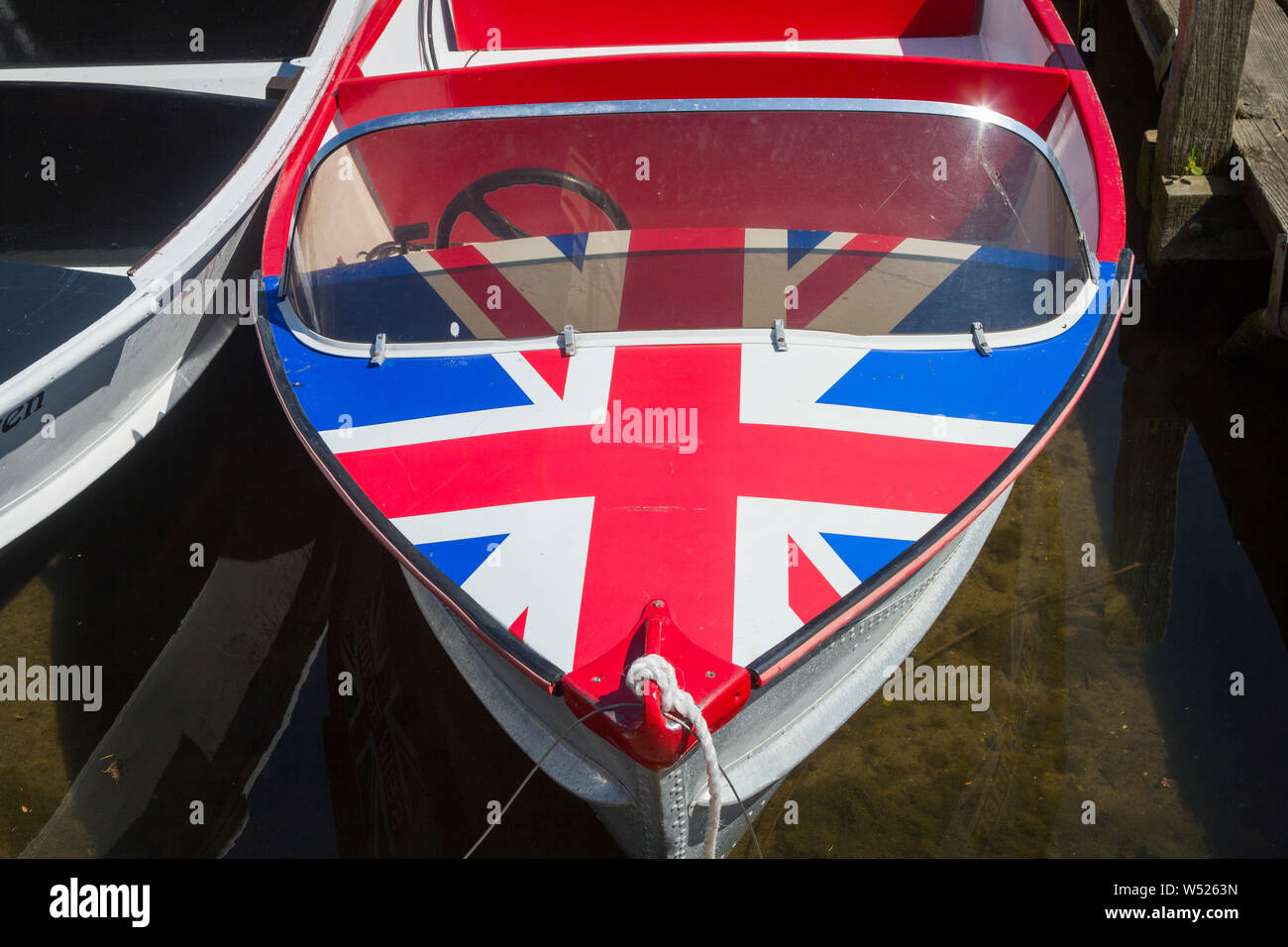 A colourful hire boat with Union Flag design at Henley-on-Thames, Oxfordshire Stock Photo