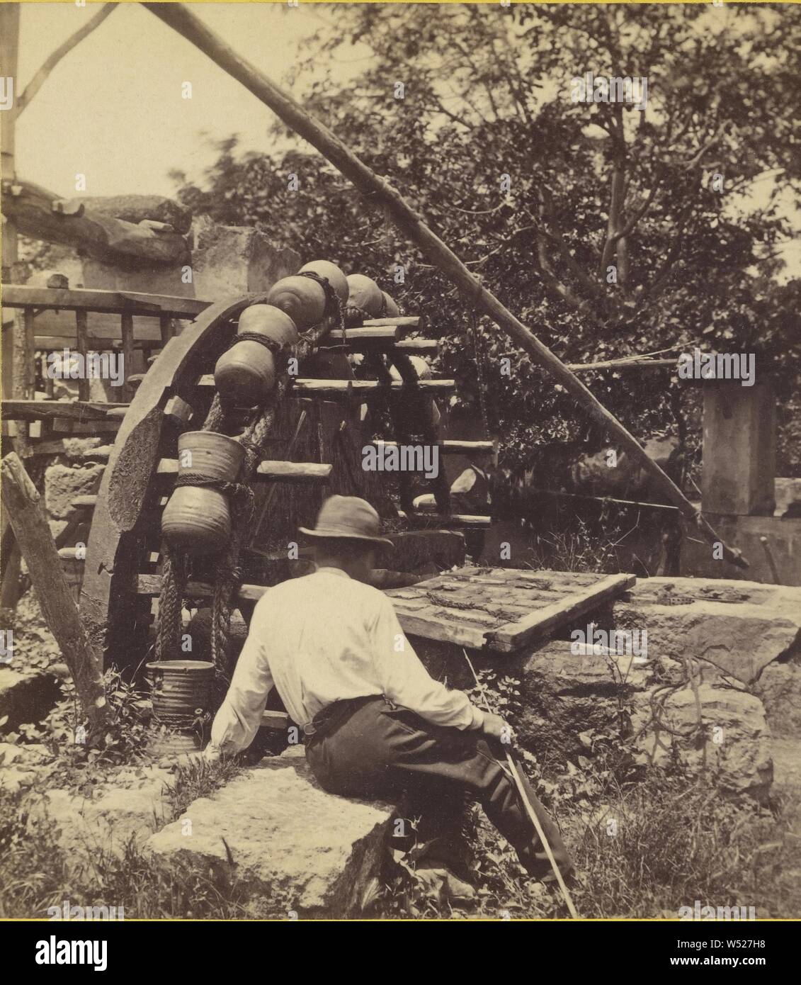 Cordova - A Persian Water Wheel. The same as used in Egypt for raising water for irrigation., Frank Mason Good (English, 1839 - 1928), about 1870, Albumen silver print Stock Photo