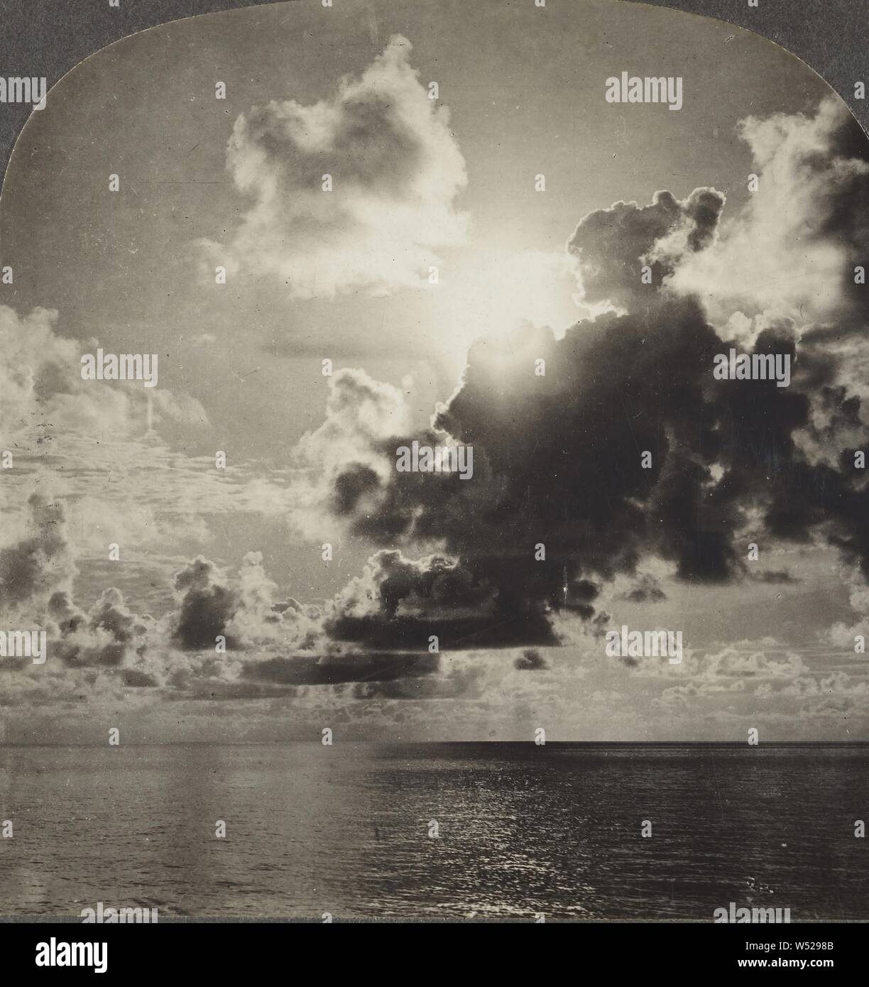 The Radiant Splendor of an Equatorial Sunrise off the Coast of Java, Dutch East Indies., Keystone View Co. (American, 1892 - 1963), 1900s, Gelatin silver print Stock Photo