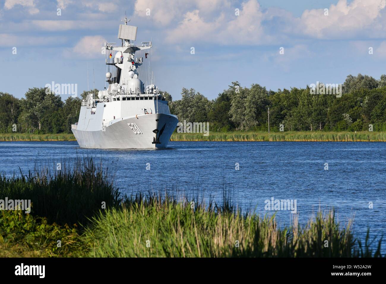 A Type 54A (Nato: Jiangkai II) frigate, the F 531 'Xiangtan', leaves the Baltic Sea via the Kiel Canal, taken near Breiholz. The ships of the type 54A are modern multipurpose frigates which are built in large numbers. They are relatively inexpensive and are also exported to Pakistan. Much of the electronic equipment and armament of these ships is still based on Russian technology. The Navy of the People's Republic of China has been for years to modernize its fleet and expand. The goal is to transform the fleet from a pure coastal defense fleet into a global fleet. As part of this, China has be Stock Photo