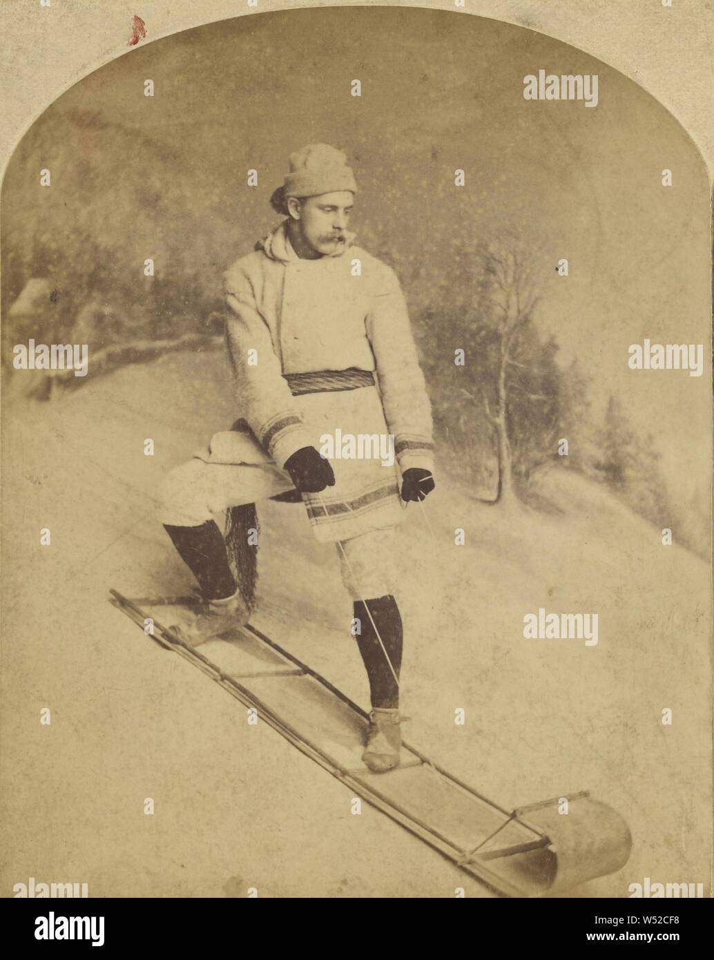 Man on bobsled, William Notman (Canadian, born Scotland, 1826 - 1891), about 1876, Albumen silver print Stock Photo