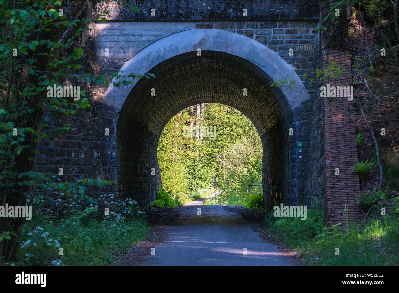 Wupper hiking trail through a railway tunnel near Marienheide, Germany Stock Photo