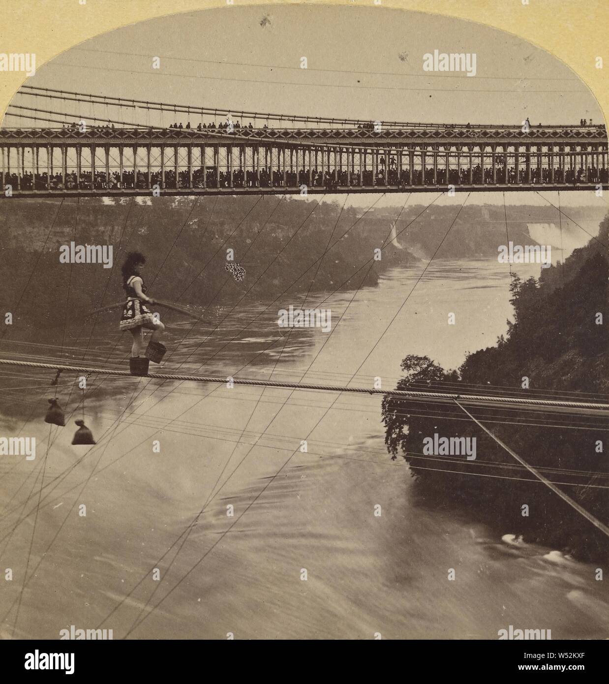 Signorini Maria Spelterini, crossing Whirl Pool Rapids, Niagara, on a rope. On line of N.Y.C. & H.R.R.R., George Barker (American, 1844 - 1894), July 1876, Albumen silver print Stock Photo