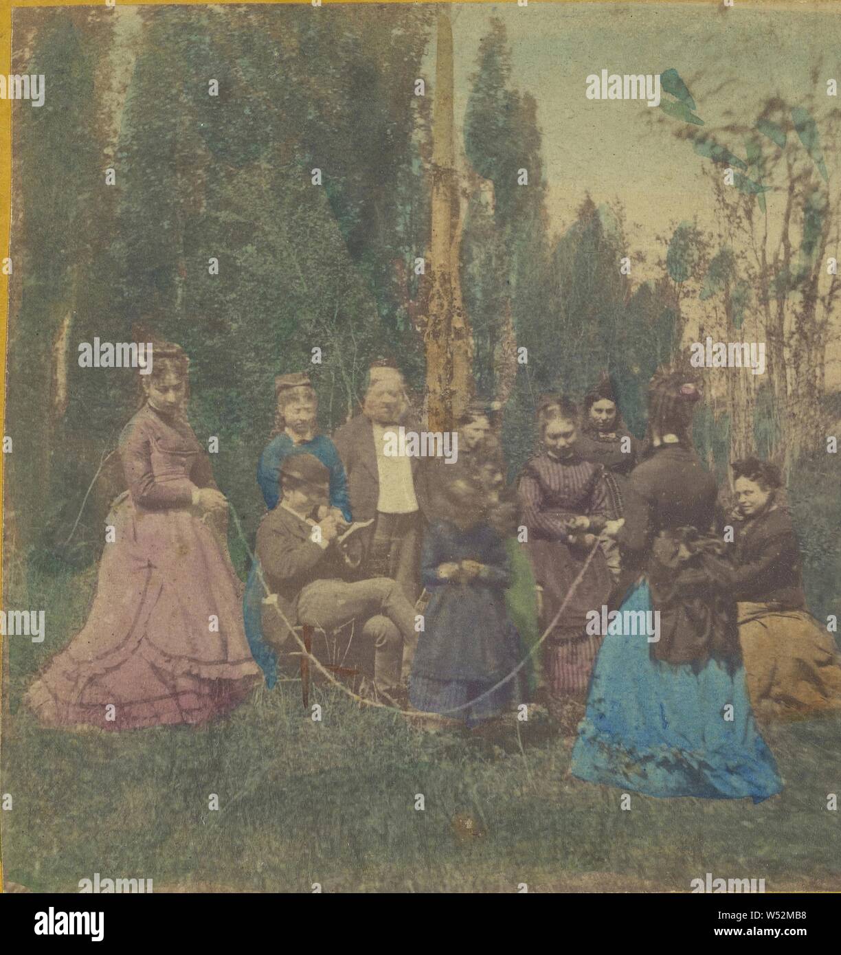 Two women twirling a rope for a child, others observing, Unknown, about 1860, Hand-colored albumen silver print Stock Photo
