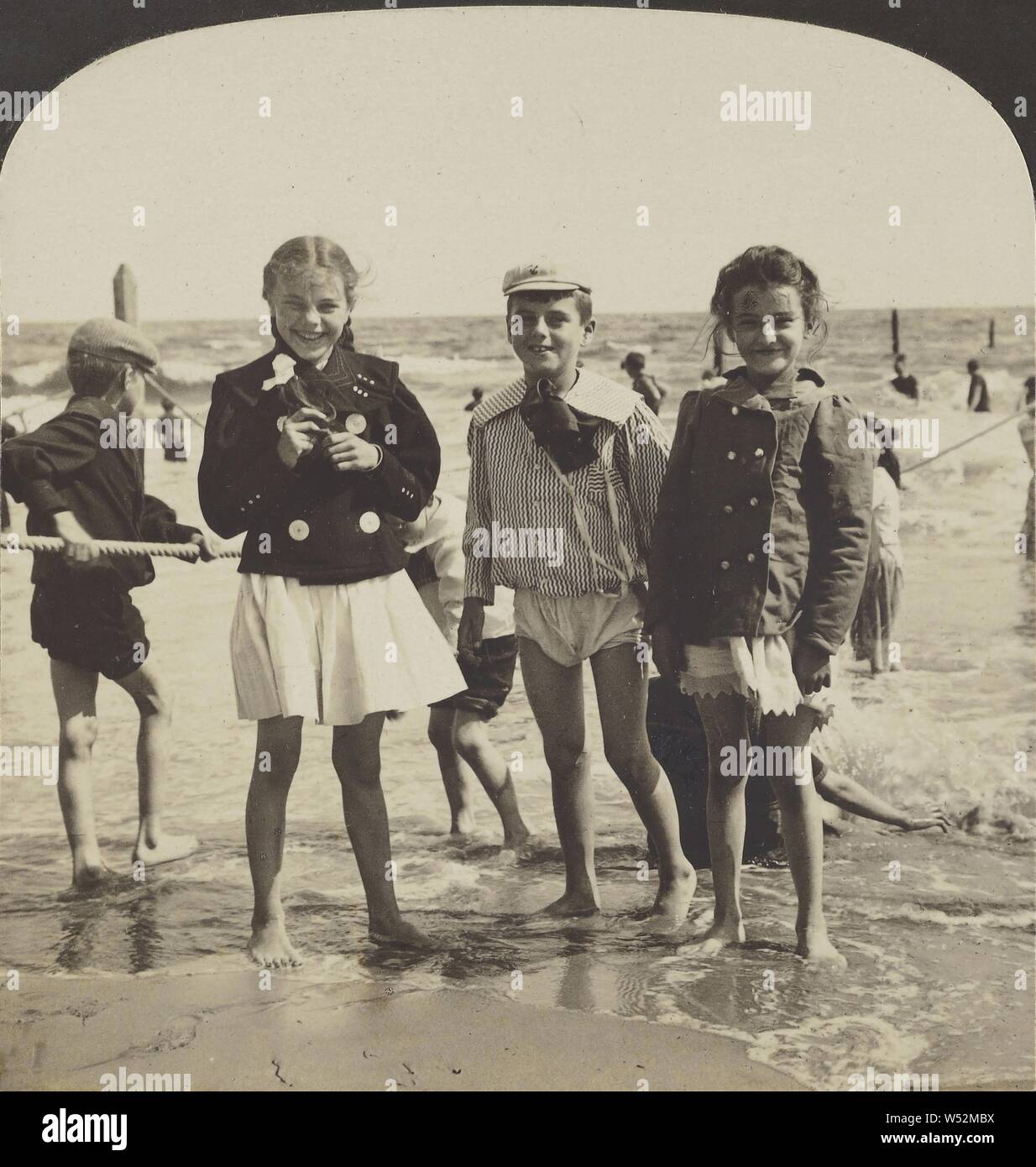 Happy youngsters on the beach, Coney Island, N.Y., U.S.A., Hawley C. White Company, 1901, Gelatin silver print Stock Photo