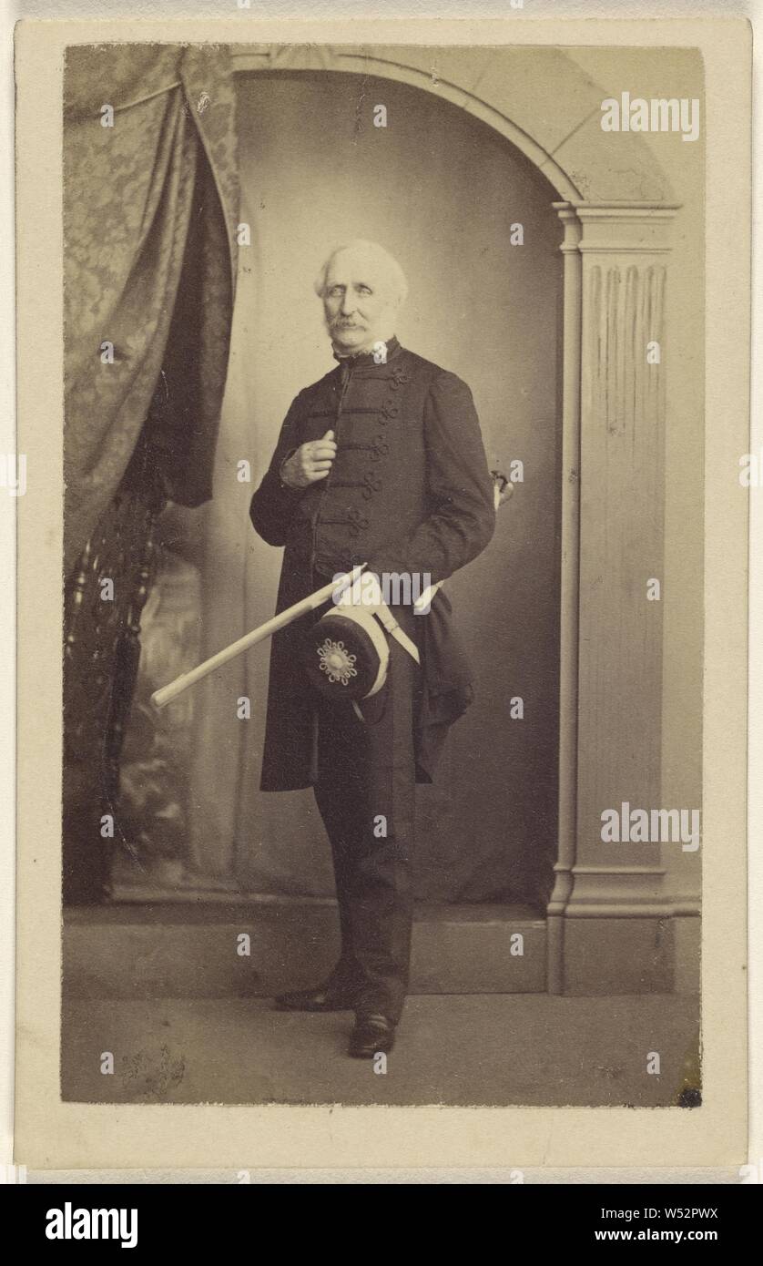 Unidentified man wearing a dress uniform, standing, holding a hat with his sword under his arm, Thomas Rodger (Scottish, 1832 - 1883), 1865–1875, Albumen silver print Stock Photo