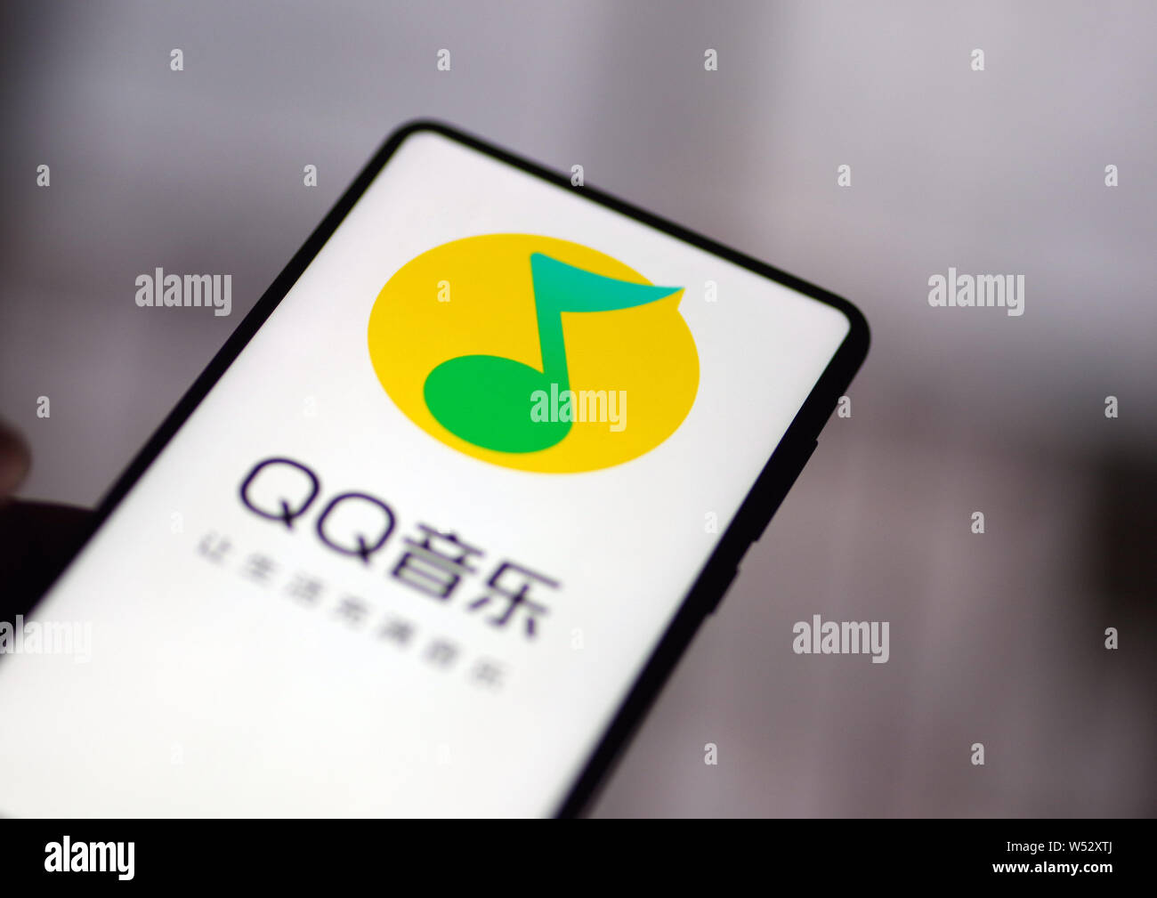 A Chinese Resident Uses The App Of Qq Music Of Tencent Music Entertainment Group Tme On His Smartphone In Ji Nan City East China S Shandong Provinc Stock Photo Alamy