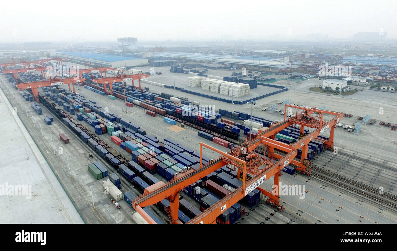 Freight Container Center --FILE--Containers to be loaded in a freight train are seen at a ...