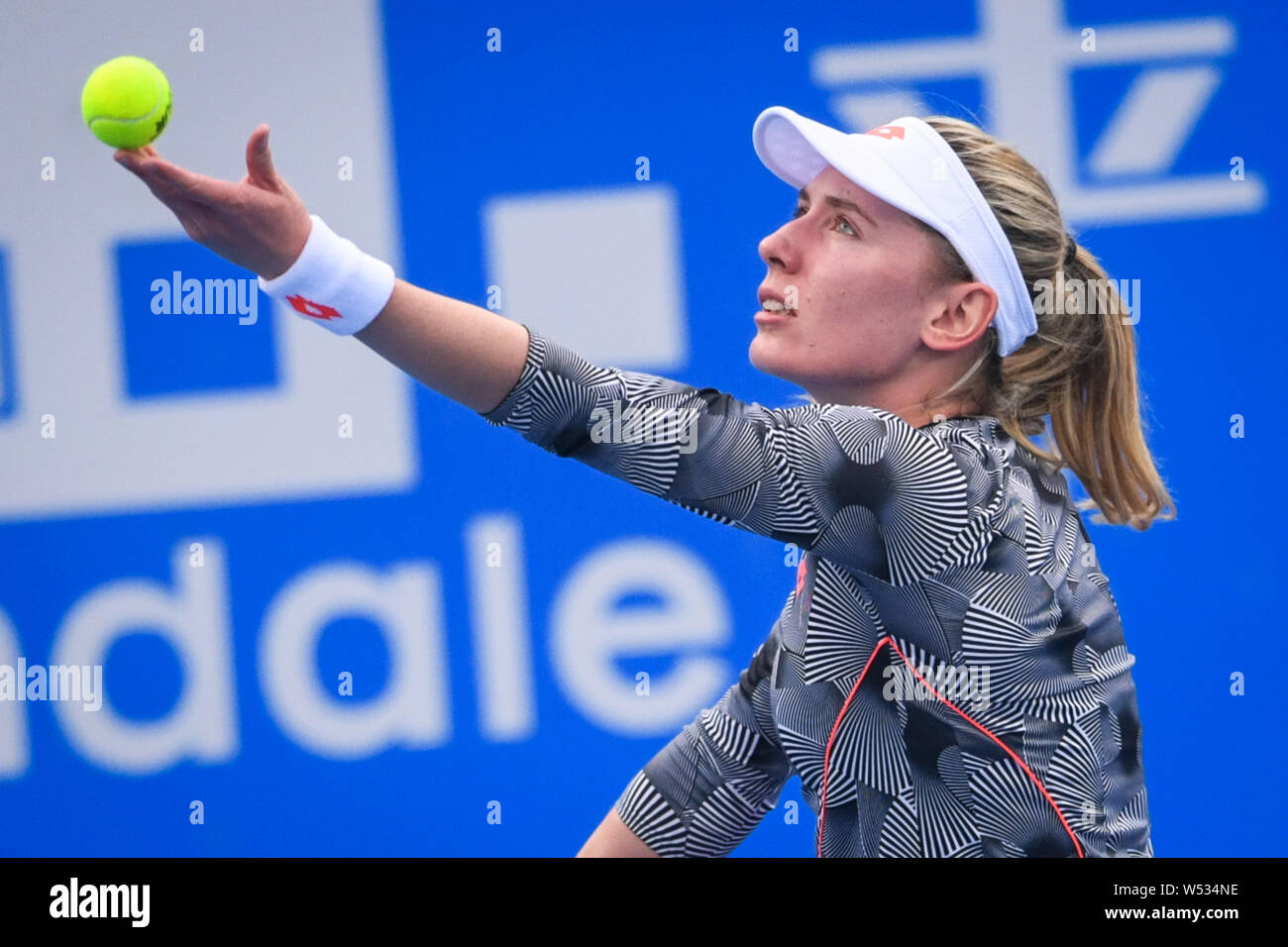 Ekaterina Alexandrova of Russia serves against Aryna Sabalenka of