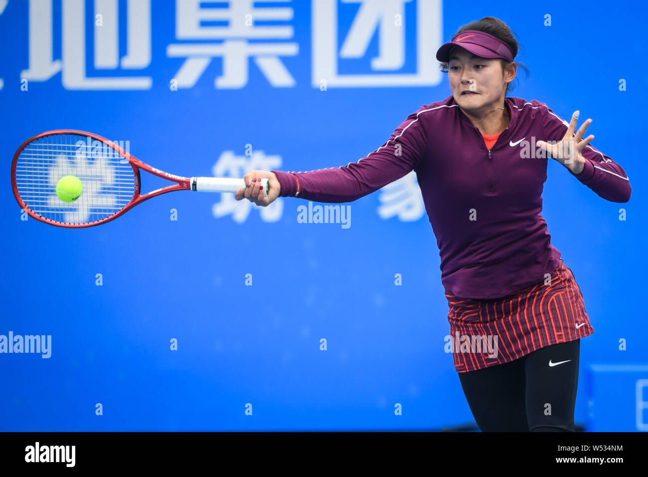 Wang Yafan of China returns a shot to Ons Jabeur of Tunis in their women's  singles second round match of the WTA 2019 Shenzhen Open tennis tournament  Stock Photo - Alamy