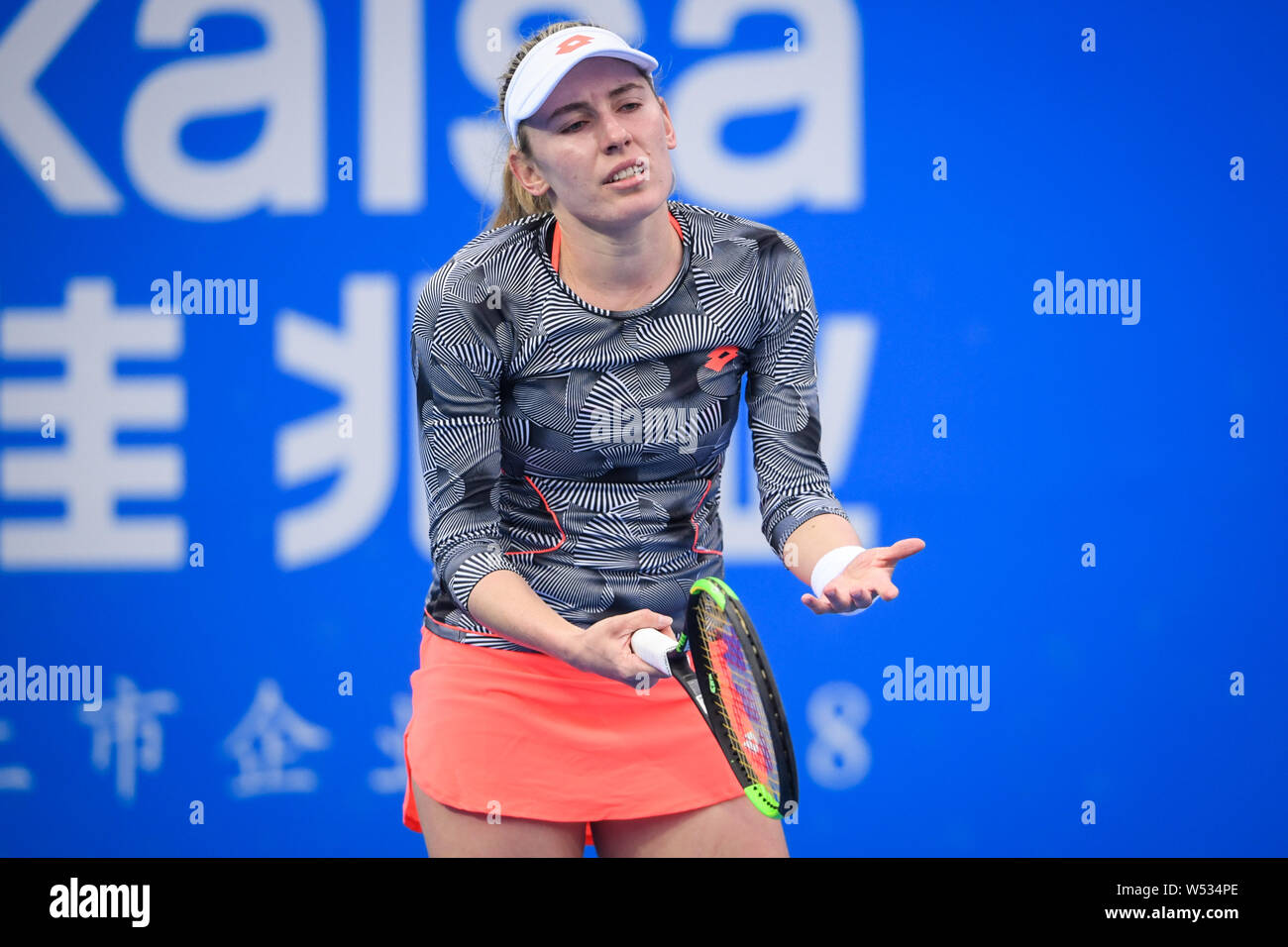 Ekaterina Alexandrova of Russia reacts as she competes against Aryna