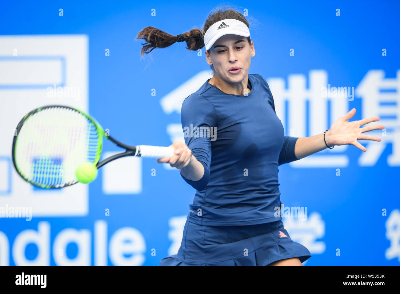 Ivana Jorovic of Serbia returns a shot to Caroline Garcia of France in  their women's singles first round match of the WTA 2019 Shenzhen Open tennis  to Stock Photo - Alamy