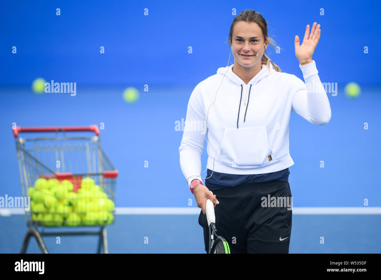Aryna Sabalenka of Belarus interacts with a little fan ahead of the 2019 WTA Shenzhen Open tennis tournament in Shenzhen city, south China's Guangdong Stock Photo