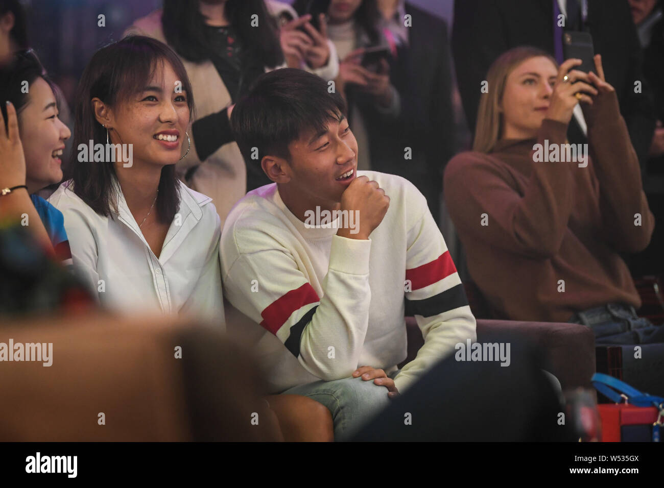 Chinese tennis player Wang Qiang, left, and her tennis player boyfriend