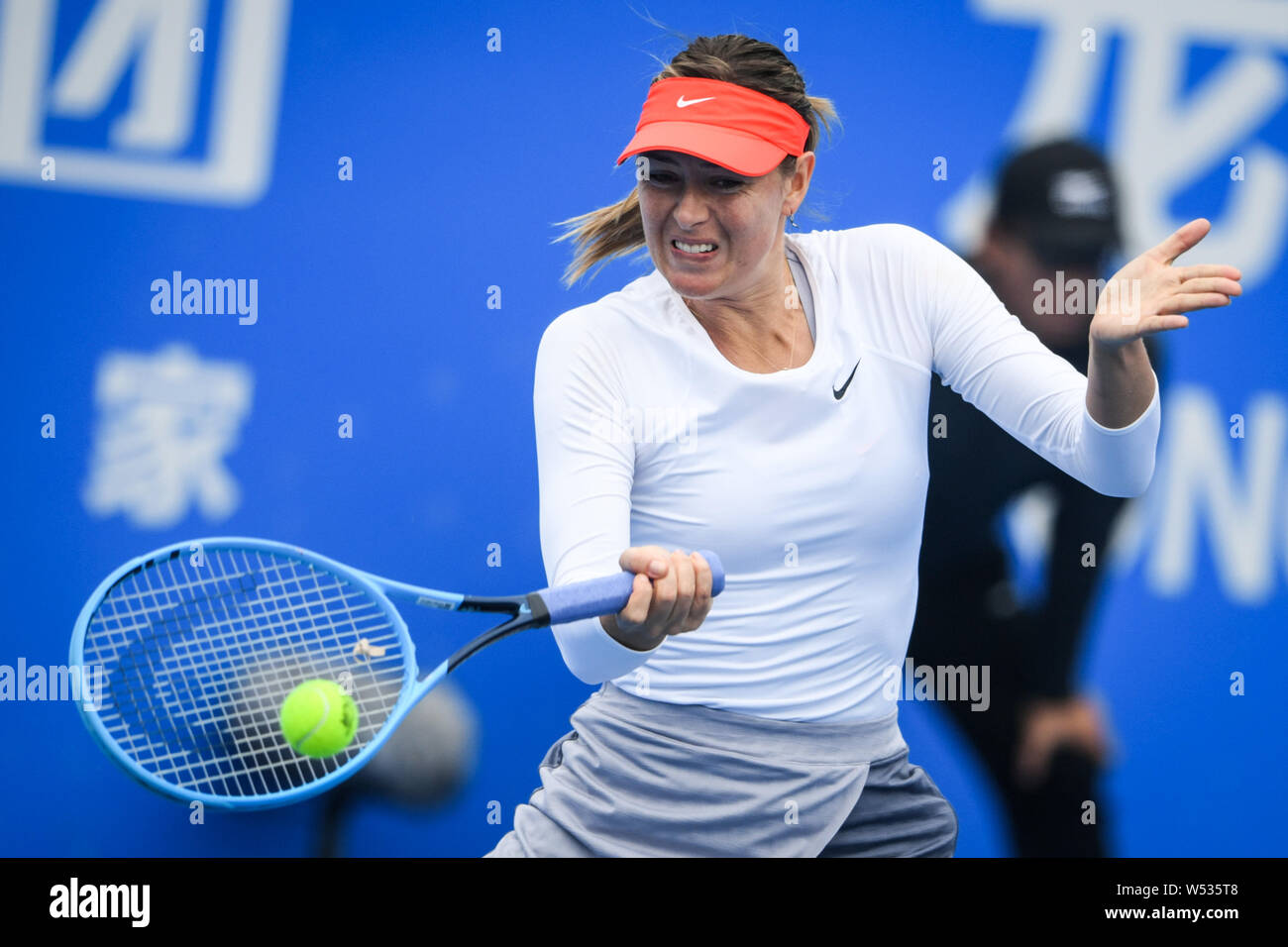 Maria Sharapova of Russia returns a shot to Wang Xinyu of China in their  second round match of the women's singles during the 2019 WTA Shenzhen Open  t Stock Photo - Alamy