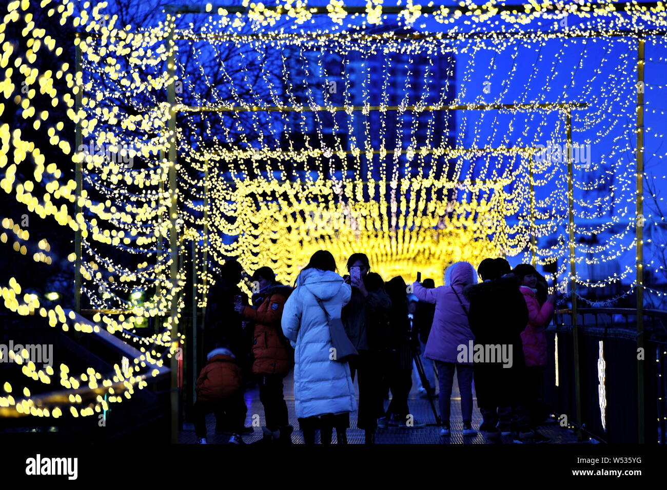 Lights illuminate the 798 Art Zone for the upcoming Chinese Lunar New Year or the Spring Festival in Beijing, China, 20 January 2019. Stock Photo