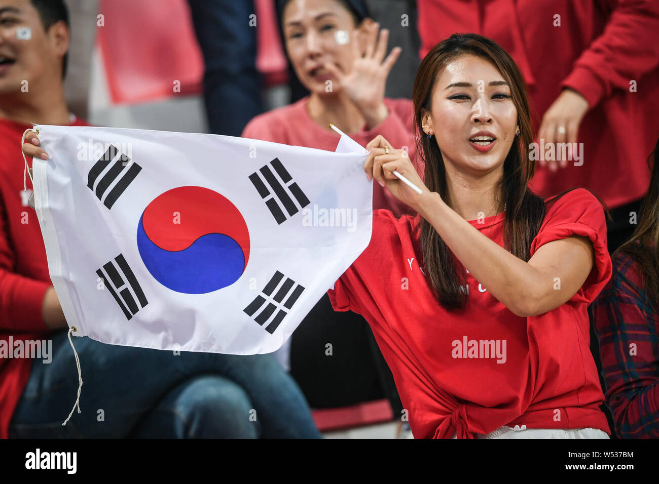 South Korean football fans show support for South Korea national football team in the round of 16 match between South Korea and Bahrain during the 201 Stock Photo