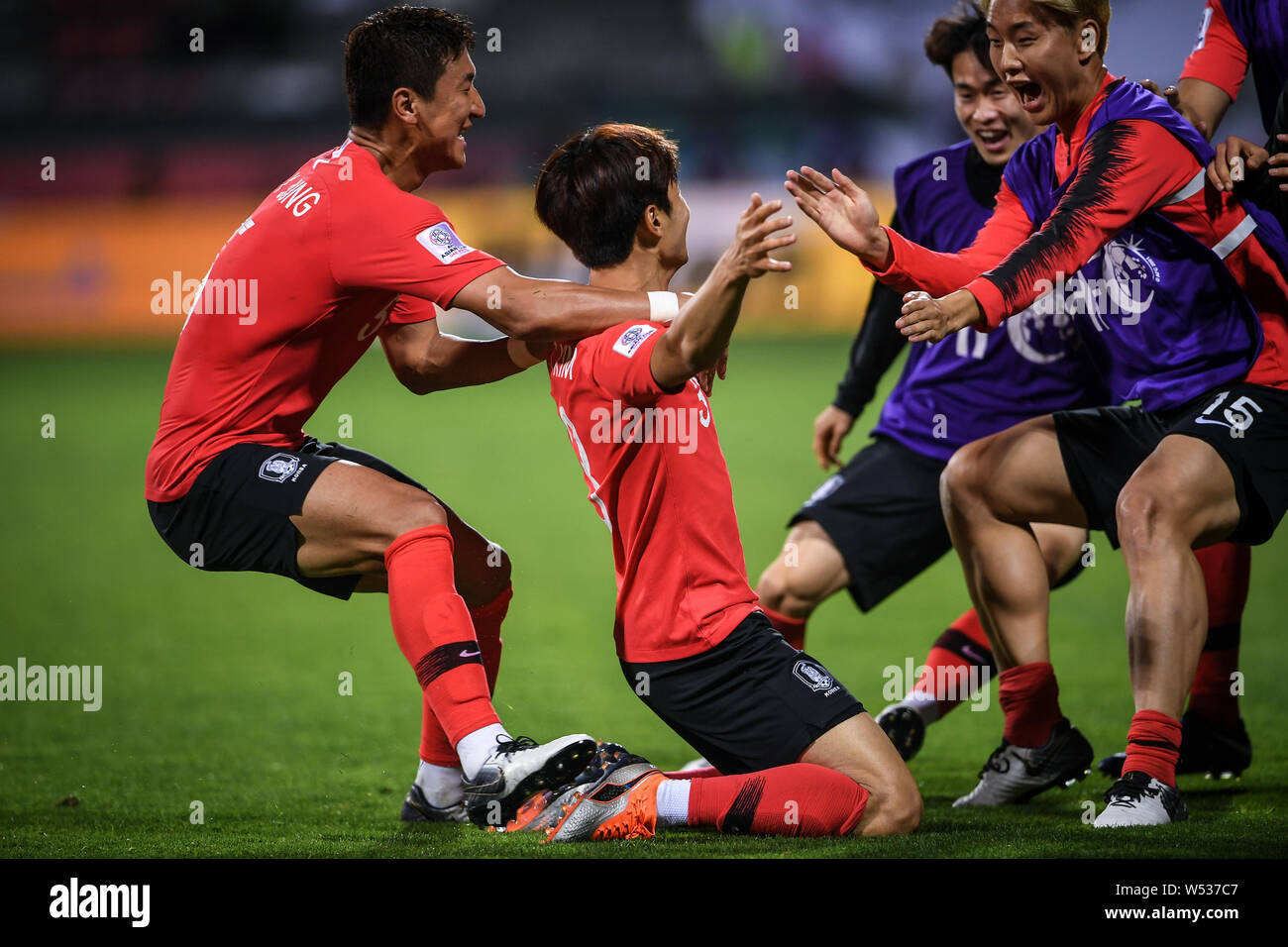 Kim Jin-su and teammates of South Korea celebrate after soring a goal against Bahrain in the round of 16 match between South Korea and Bahrain during Stock Photo