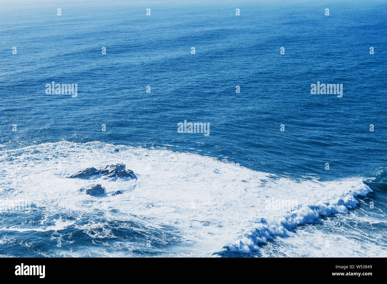 View of the blue sea or ocean with foam and waves background Stock ...