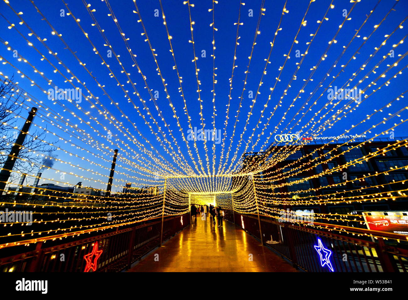 Lights illuminate the 798 Art Zone for the upcoming Chinese Lunar New Year or the Spring Festival in Beijing, China, 20 January 2019. Stock Photo