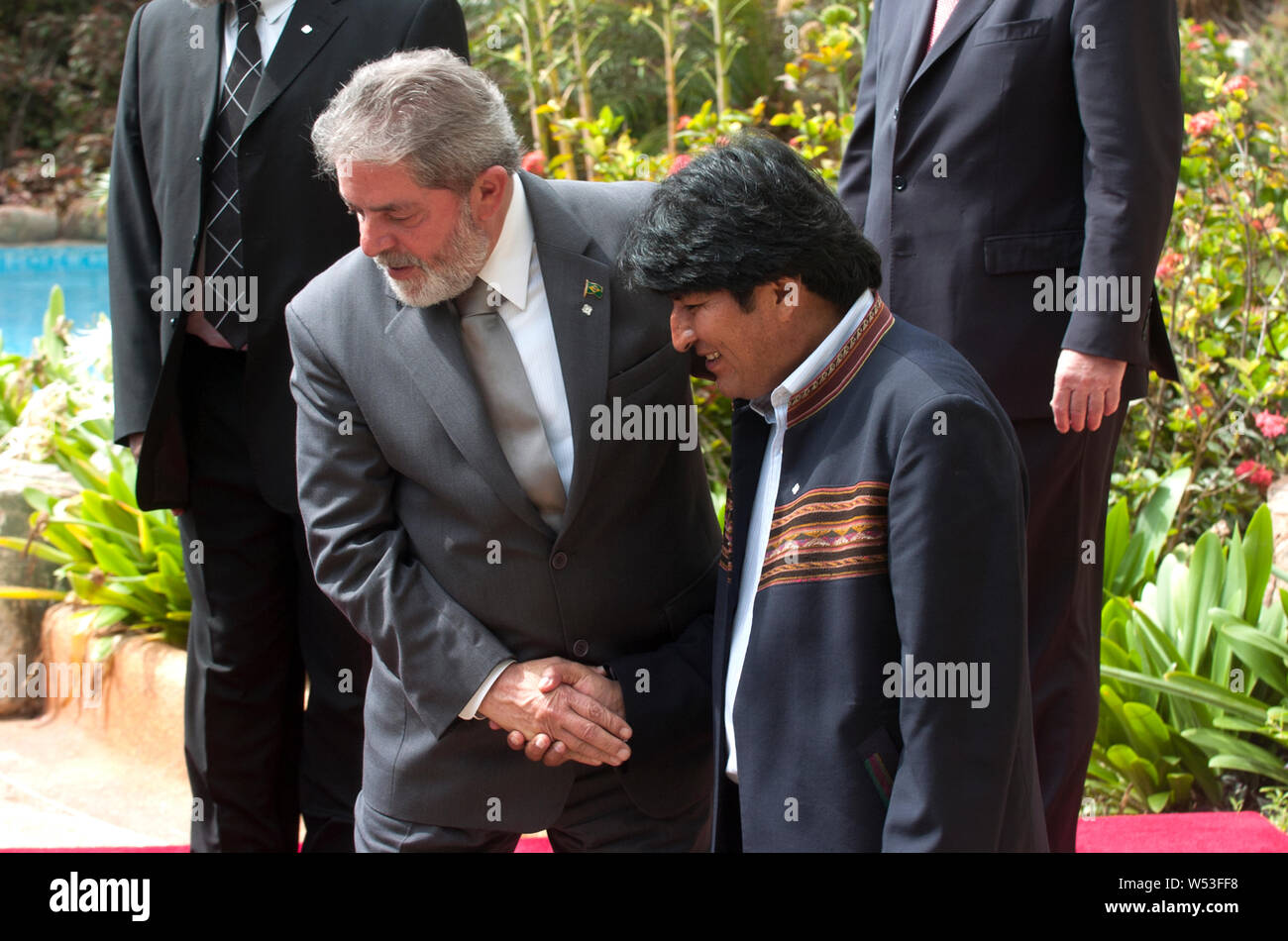 Latin American Presidents Lula da Silva of Brazil (l) and Evo Morales of Bolivia, shake hands in a submit in Venezuela Stock Photo
