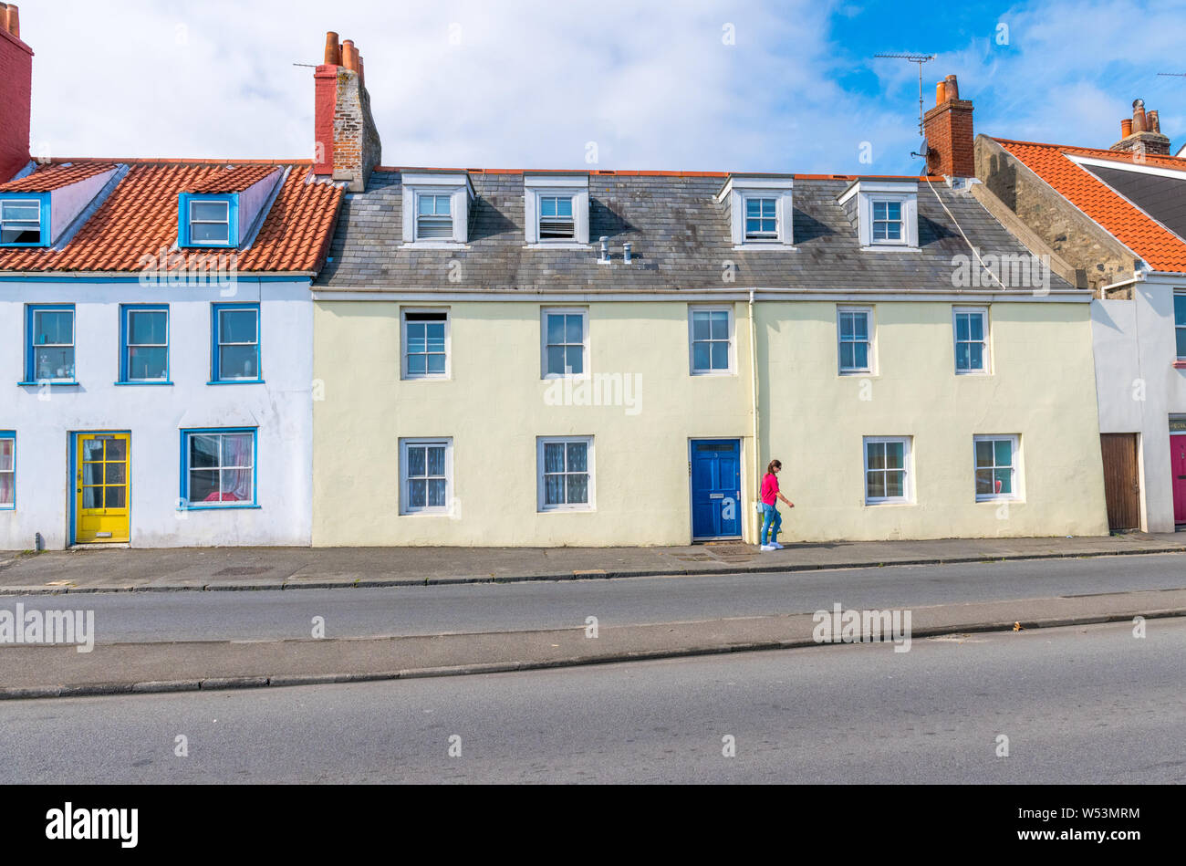 Pastel Coloured Cottages On The Channel Island Of Guernsey Stock