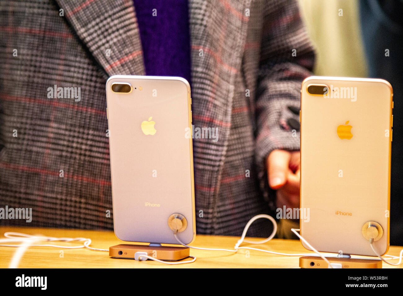 File Chinese Customers Try Out Iphone Smartphones At An Apple Store In Shanghai China 19 January 2019 Hon Hai Precision Industry Better Kn Stock Photo Alamy