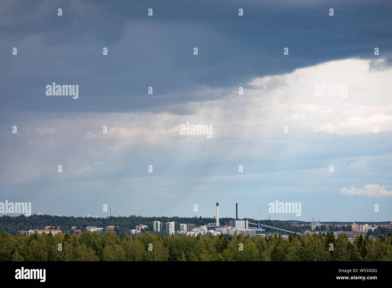 Summer day raining viewed from far Stock Photo - Alamy