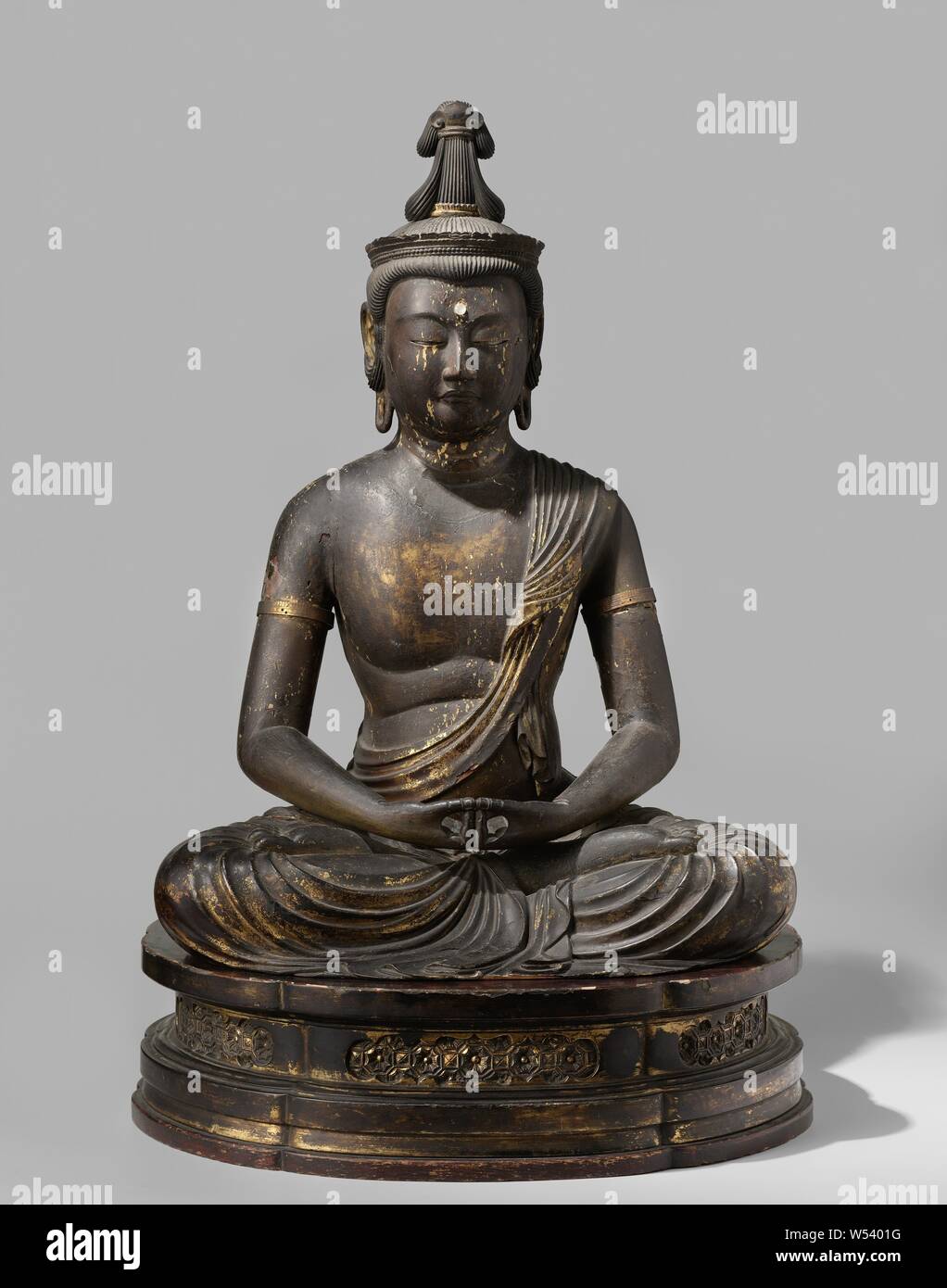 The Buddha Amida Nyorai, Dainichi Nyorai, sitting in a meditation posture on a throne., anonymous, Japan, c. 1500 - c. 1600, wood (plant material), h 59.0 cm × w 45.0 cm × d 33.0 cm × h 72.5 cm × w 47.5 cm × d 40.5 cm Stock Photo