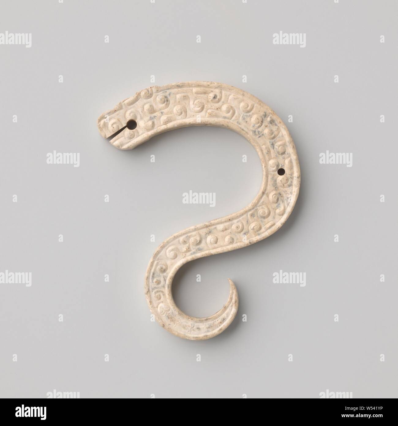 Ornament in the shape of an S-shaped snake, comma ornament, cream-colored  jade., anonymous, China, -500 - -200, Zhou-dynasty (1050 B.C.-221 B.C.),  jade (rock), w 5.8 cm × h 4.5 cm × d 0.6 cm Stock Photo - Alamy