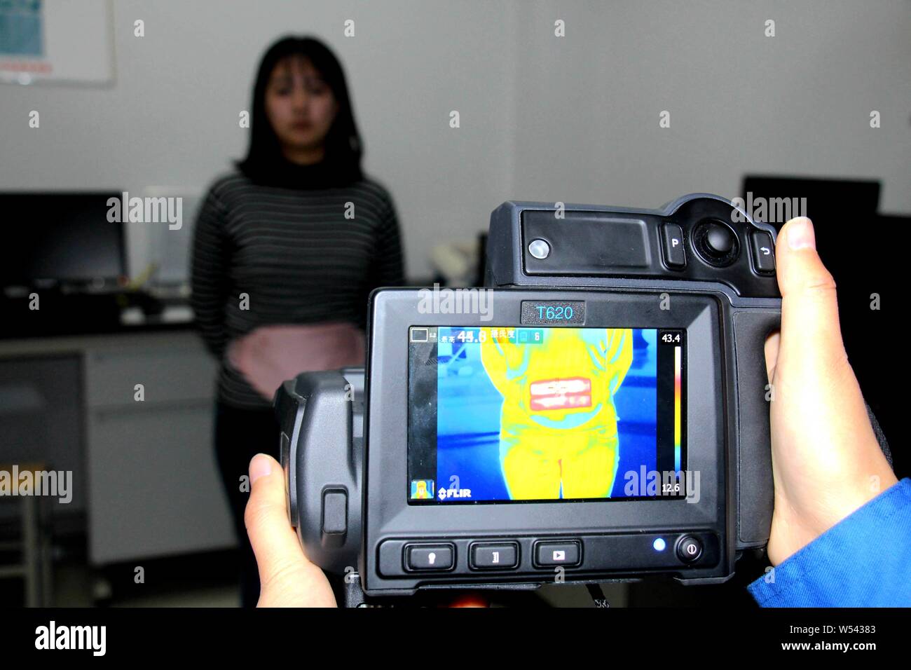A Chinese worker uses a forward-looking infrared (FLIR) camera to test the  heating ability of a product made of China's first far infrared conductive  Stock Photo - Alamy