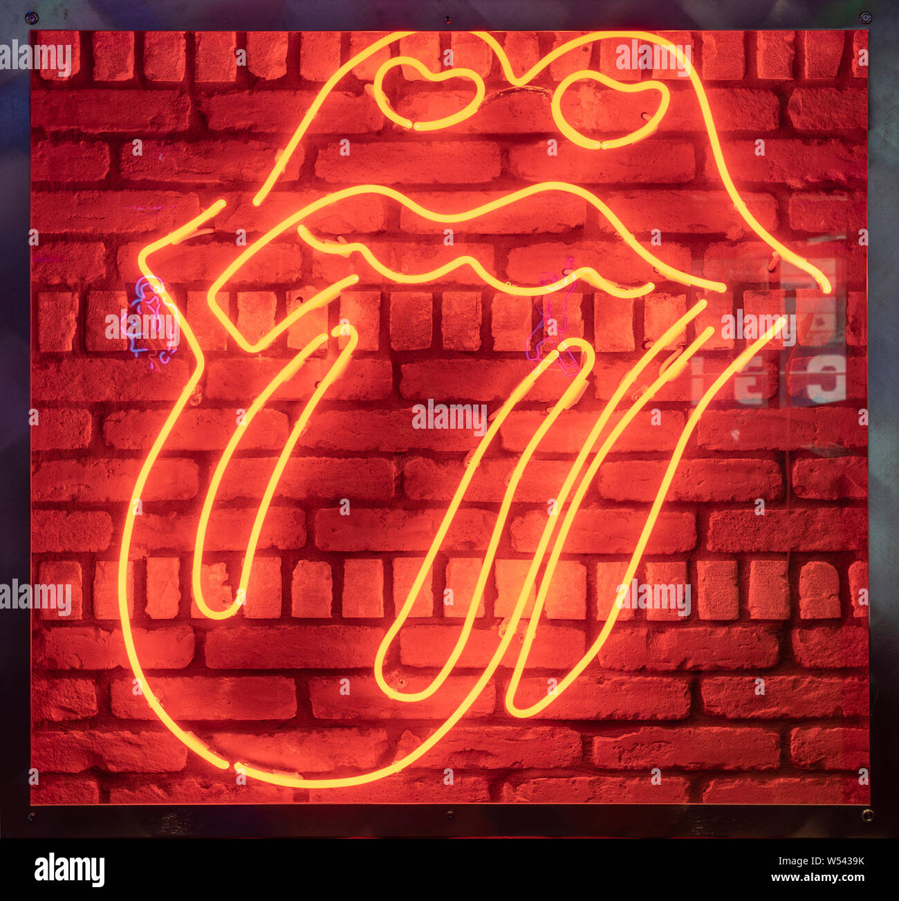 Rock Lips with Tongue out with Neon Light Stock Photo