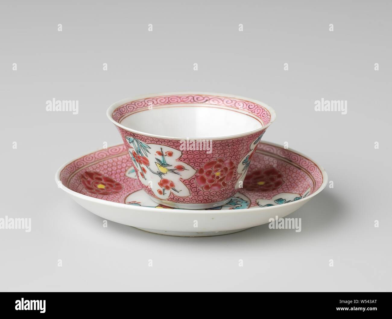Cup and saucer with a Chinese lady and boy in a landscape and flower sprays on diaper pattern, Porcelain cup and saucer with a spreading wall, painted on the glaze in blue, red, pink, green, yellow and black. On the plate of the dish a medallion with a Chinese lady and a boy in a landscape with trees and rocks, the medallion napkin with three flowers and three cartouches with a bird or insect on a flower branch (prunus, peony, lotus), the inner edge with a curled band. The cup with the same decoration. A crack in the wall of the head. Famille rose., anonymous, China, c. 1725 - c. 1749, Qing Stock Photo