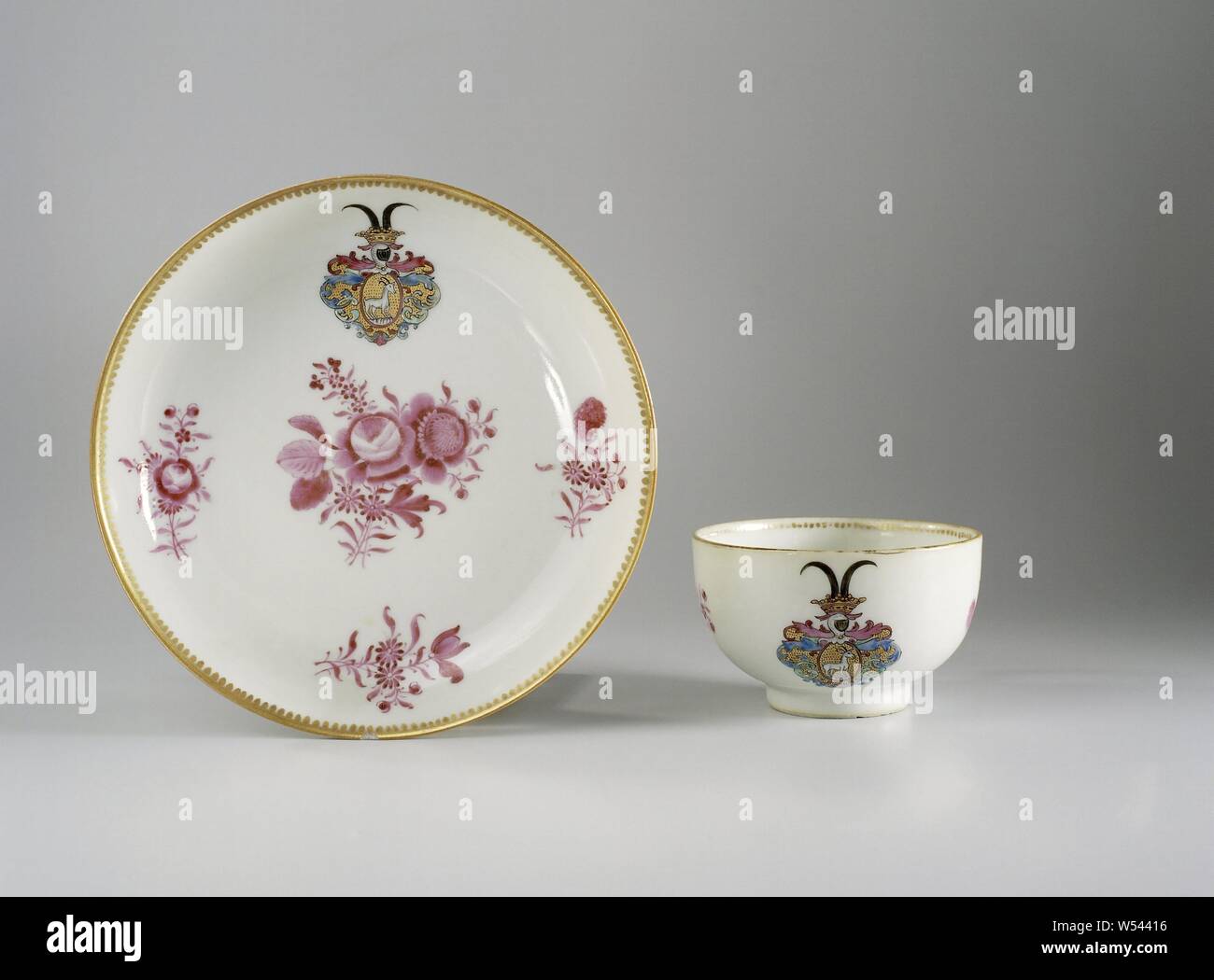 Cup with handle and saucer with flower bouquets and a coat of arms, Ear cup  and saucer of porcelain, painted on the glaze in blue, red, pink, green,  black and gold. On