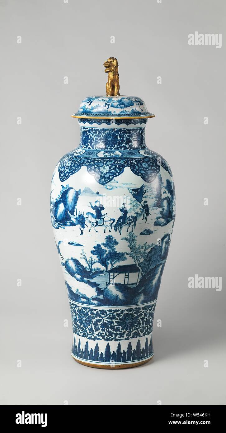 Baluster vase with a hunting scene and borders with floral baluster vase with a hunting scene and borders with floral scrolls porcelain lid painted in underglaze blue and on the glaze gold on the wall a hunting scene with hunters on horseback and on foot with weapons and dogs in a landscape with trees mountains and rocks below a band with lotus vines cover knob in the shape of a shishi blue white anonymous china c 1700 c 1724 qing dynasty 1644 1912 kangxi period 1662 1722 yongzheng period 1723 1735 porcelain material glaze cobalt mineral gold metal vitrification h 24 cm d 33 cm image
