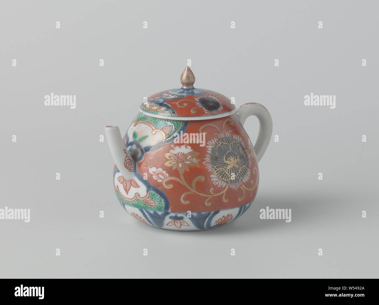 Teapot With Lotus Scrolls And Flower Roundels Porcelain Teapot With Pear Shaped Body C Shaped Ear And Slightly Curved Spout Painted In Underglaze Blue And On The Glaze Red Green Black And Gold On