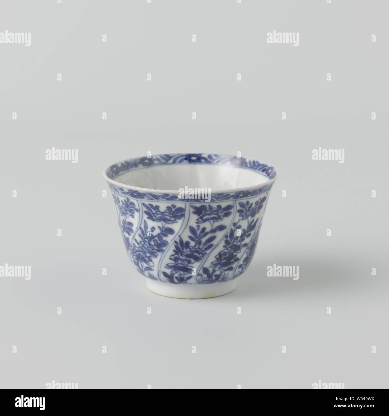 Cup With Twisted Panels With Flower Sprays Porcelain Cup With The Wall Modeled In Twisted Boxes Painted In Underglaze Blue The Wall With Twisted Boxes With Flower Branch A Medallion With A